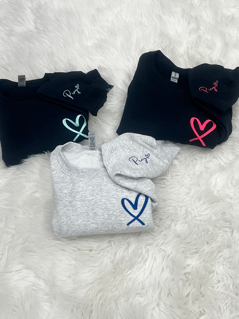 Embroidered pray with heart